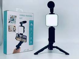 Video-making kit with light and stand on a white background